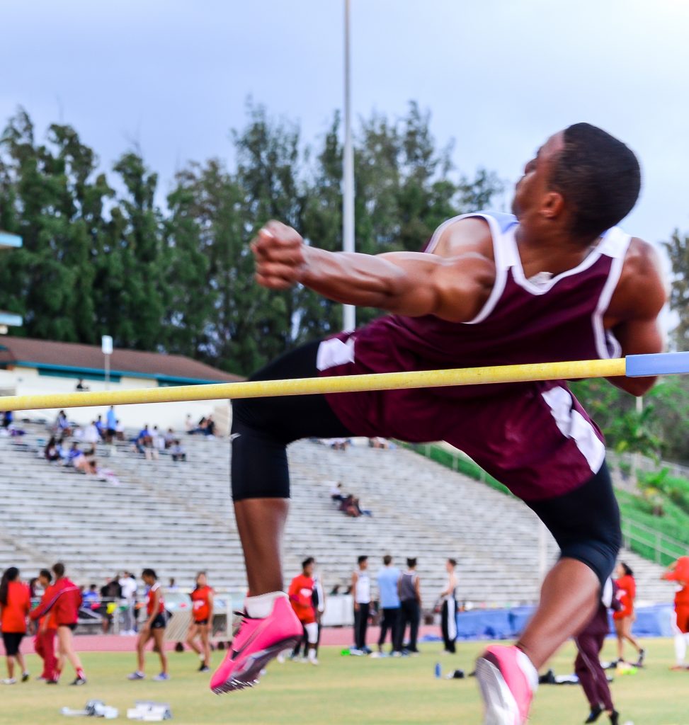 Baldwin's La'akea Kahoohanohano-Davis clears the high jump bar at 6-foot, 4-inches at last week's MIL Meet #4. Photo by Rodney S. Yap.