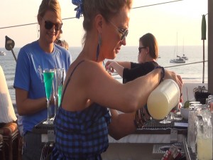 Bartender prepares blue cocktails at Fleetwood's on Front Street. Photo by Kiaora Bohlool.