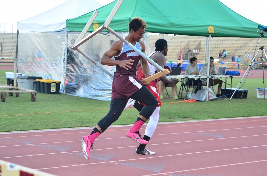 This 11-shot sequence by photographer Glen Pascual shows Baldwin High School's La'akea Kahoohanohano-Davis' attempt to push down the last hurdle in the 110-meter high hurdle race Saturday in the finals of the Victorino Ohana Invitational. But instead of going to the ground, the hurdle bounces back up and wraps itself around Kahoohanohano-Davis as he tries to finish the race. Photo by Glen Pascual.