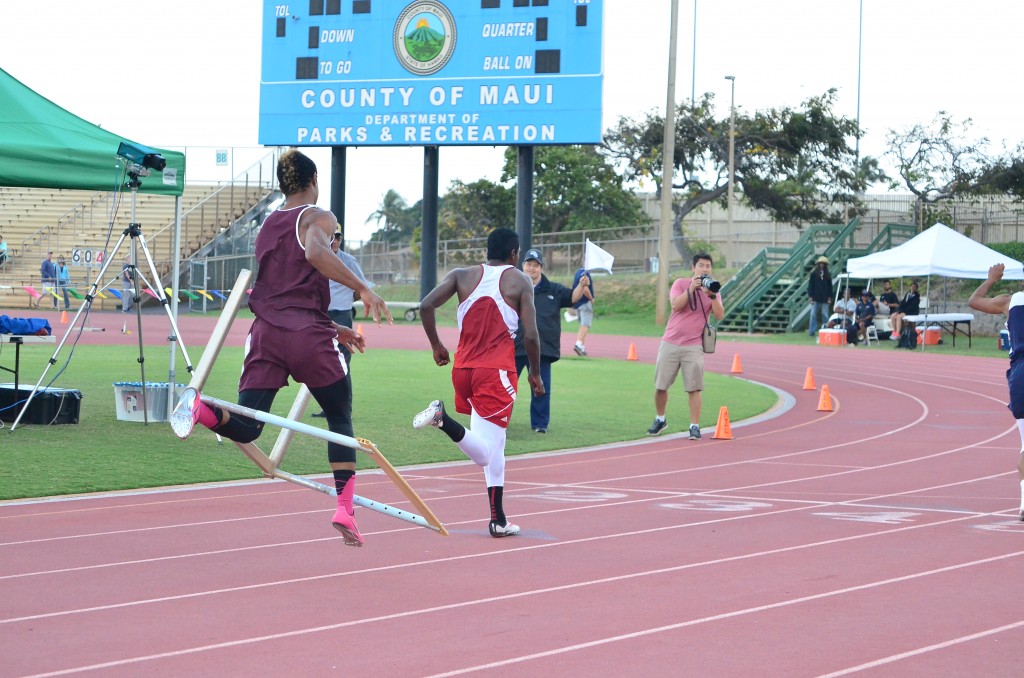 This 11-shot sequence by photographer Glen Pascual shows Baldwin High School's La'akea Kahoohanohano-Davis' attempt to push down the last hurdle in the 110-meter high hurdle race Saturday in the finals of the Victorino Ohana Invitational. But instead of going to the ground, the hurdle bounces back up and wraps itself around Kahoohanohano-Davis as he tries to finish the race. Photo by Glen Pascual.