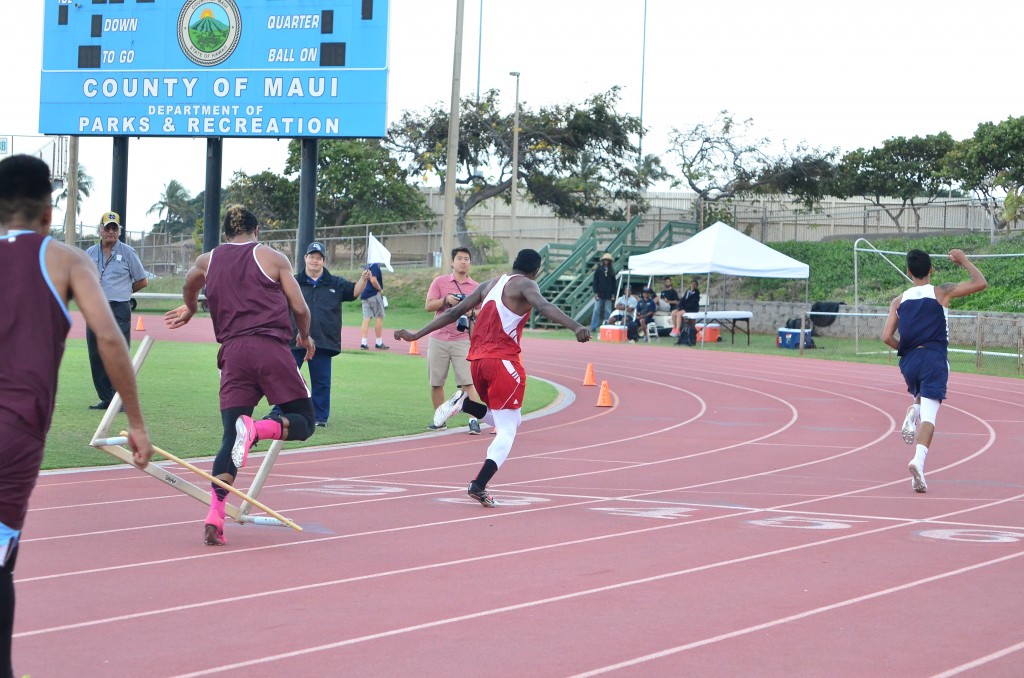 This 11-shot sequence by photographer Glen Pascual shows Baldwin High School's La'akea Kahoohanohano-Davis' attempt to push down the last hurdle in the 110-meter high hurdle race Saturday in the finals of the Victorino Ohana Invitational. But instead of going to the ground, the hurdle bounces back up and wraps itself around Kahoohanohano-Davis as he tries to finish the race. Photo by Glen Pascual.