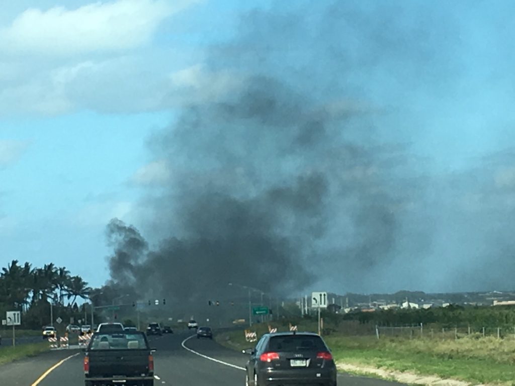 Fire Burns Abandoned Vehicles in Vacant Kahului Field. (4.18.16) Photo credit: Kaimana Nakamura.