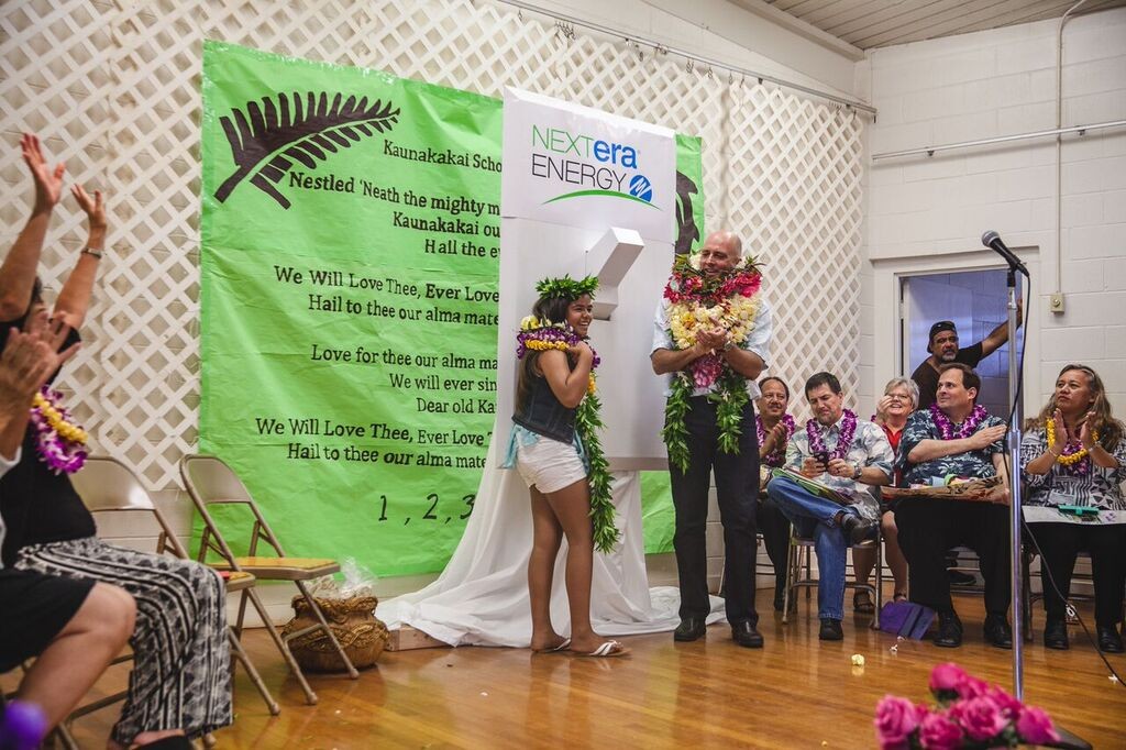 A celebration assembly was held Friday, April 8, at Kaunakakai Elementary to mark the completion of a hybrid solar air conditioning installation project. Sixth-grader and Student Council President Leonahemaikekaimalie Crivello was commended for helping the project become a reality. Photo credit: Kaipo Kiaha (Oiwi Television) via Hawaiʻi Department of Education.