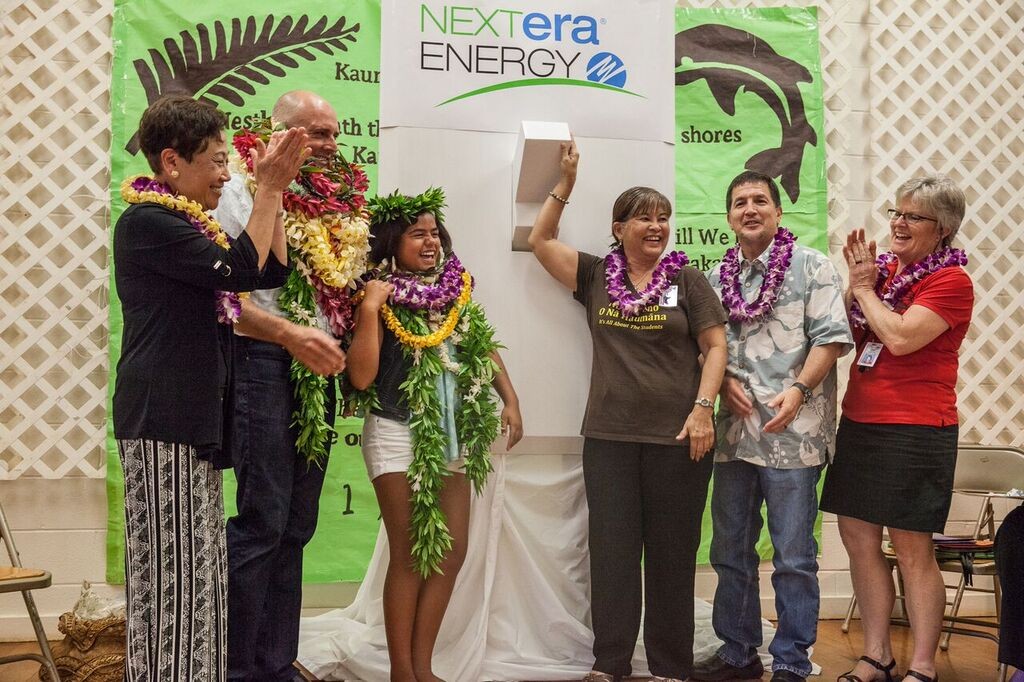 A celebration assembly was held Friday, April 8, at Kaunakakai Elementary to mark the completion of a hybrid solar air conditioning installation project. Sixth-grader and Student Council President Leonahemaikekaimalie Crivello was commended for helping the project become a reality. Photo credit: Kaipo Kiaha (Oiwi Television) via Hawaiʻi Department of Education.