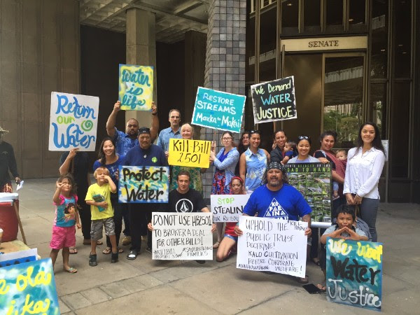 “Return Our Water!” Demand Residents and Taro Farmers Advocates take concern directly to Alexander & Baldwin's shareholders. Photo credit: Sierra Club Hawaiʻi.
