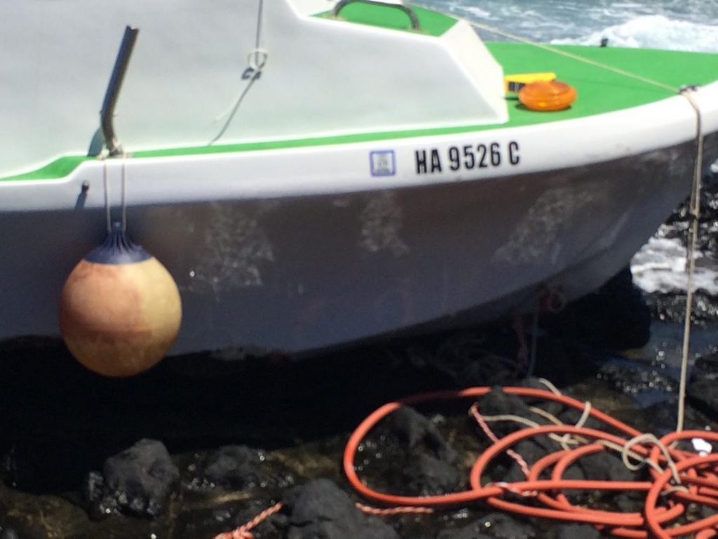 Grounded vessel at "Little Beach" in the South Maui area of Mākena. Photo credit: DLNR.