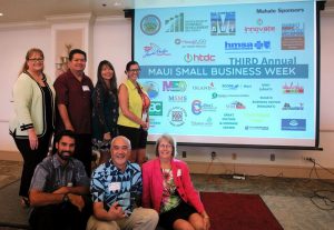 The third annual Maui Small Business Week opened on Monday, May 9: (left to right, standing) Teena Rasmussen, David Kapaku, Karen Arakawa, Nicole Fisher (seated) Kainoa Horcajo, John Hau‘oli Tomoso and Lori Fisher. Maui SBW photo.
