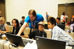 Hawai‘i students get hands-on with advanced code training with Microsoft Innovative Educator Fellow Todd Beard at the Maui Economic Development Board’s Women in Technology STEM Conference. Microsoft will bring additional opportunities to Maui County next year with two “Digi Camps.” Photo credit: Casey Nishikawa
