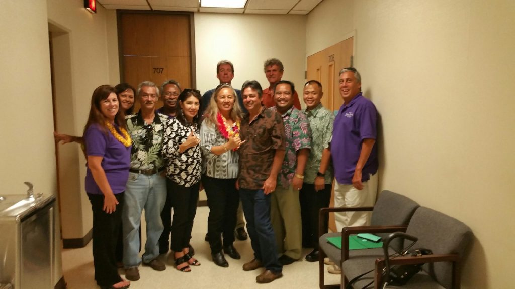 Rep. Lynn DeCoite filing her papers with her husband Russell DeCoite and friends in the Maui County Clerks Office