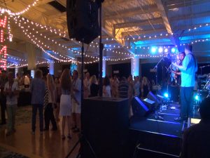 Live music and dancing at Kapalua Wine & Food Festival's seafood tasting event. Photo by Kiaora Bohlool.