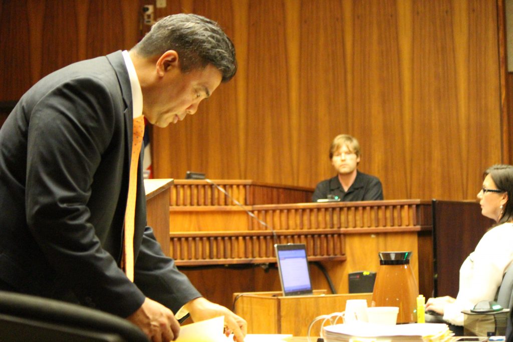 Ginseng Mileur in on the witness stand and prosecuting attorney Robert Rivera in the foreground. (6.27.16) Photo by Wendy Osher.