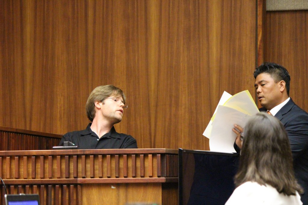 Ginseng Mileur in on the witness stand and prosecuting attorney Robert Rivera to the right. (6.27.16) Photo by Wendy Osher.