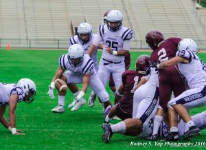 Kamehameha Kapalama's Kama Kamaka snatched this fumble by Baldwin's Bishop Wickes near the Bears' goal line Saturday. Photo by Rodney S. Yap.
