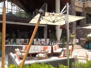 Outdoor seating at Cane & Canoe, Montage Kapalua Bay. Photo by Kiaora Bohlool.