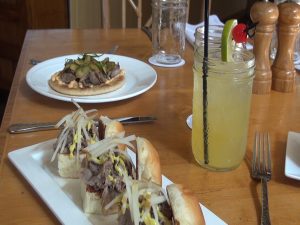 Tandoori lamb sliders and Korean prime rib pita pie, on the happy hour menu at Hali‘imaile General Store. Photo by Kiaora Bohlool.