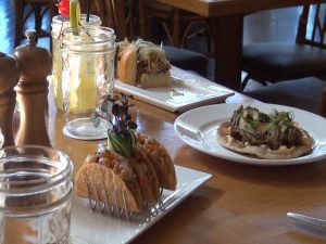 Ahi tartare and smoked salmon tacos, among the appetizers available during happy hour at Hali‘imaile General Store. Photo by Kiaora Bohlool.