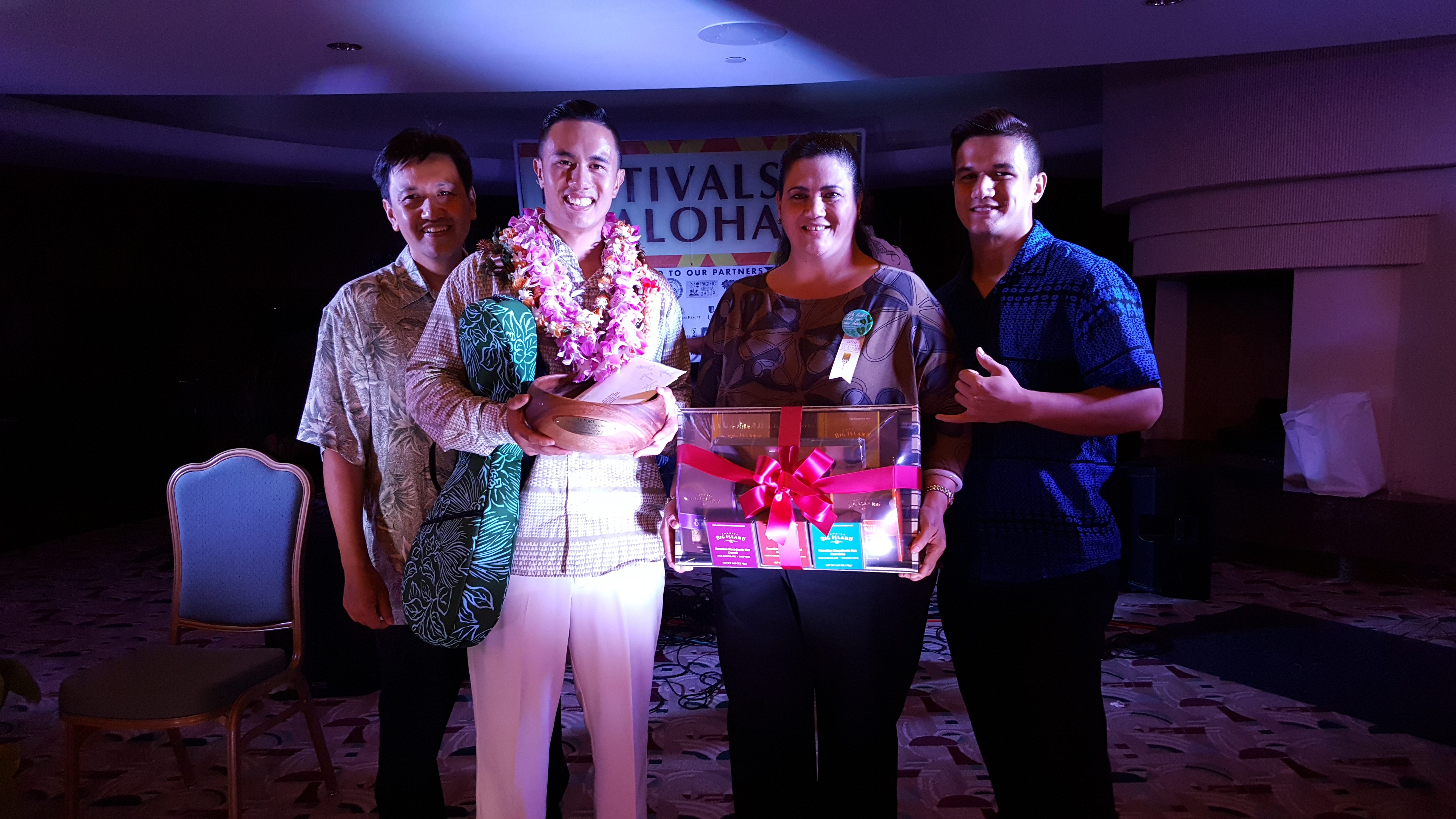Gregory James Kahikina Maikalani Maxwell Juan with his ʻohana at the 15th Richard Hoʻopiʻi Leo Kiʻekiʻe Falsetto Contest. PC: Daryl Fujiwara