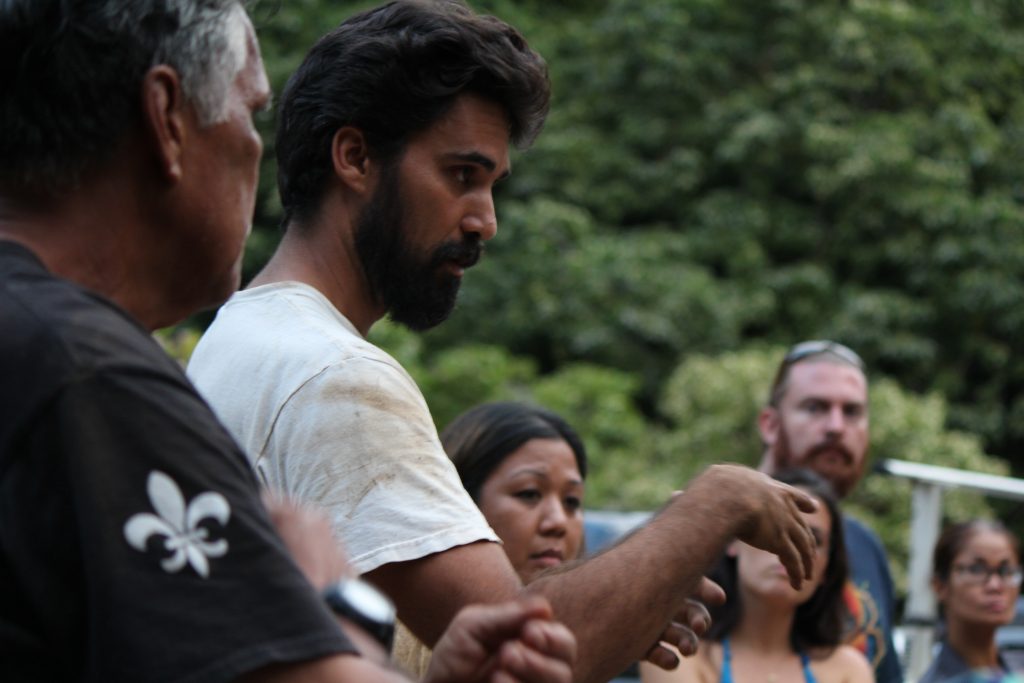 ʻĪao Valley resident, Kainoa Horcajo speaks during the emergency neighborhood meeting. His cottage now sits 3 feet from the river.