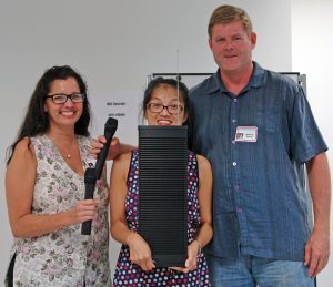 MBB organizers Nicole Fisher and Grace Fung, SCORE Maui Counselor Richard Kehoe and the new PA system. Image courtesy MBB