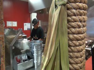 Cooking in the kitchen at Da Shrimp Hale in Maui Mall. Photo by Kiaora Bohlool.