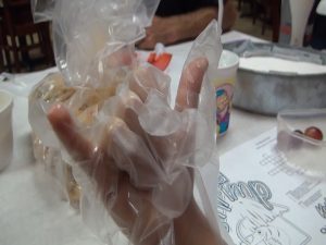 A gloved shaka at Da Shrimp Hale in Kahului. Photo by Kiaora Bohlool.