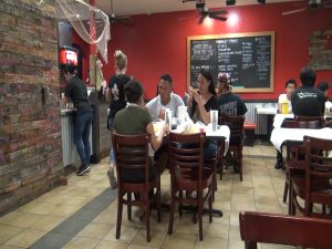 Customers at Da Shrimp Hale in Maui Mall. Photo by Kiaora Bohlool.