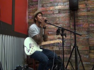 Musician Jason Arcilla performs at Da Shrimp Hale in Kahului. Photo by Kiaora Bohlool.