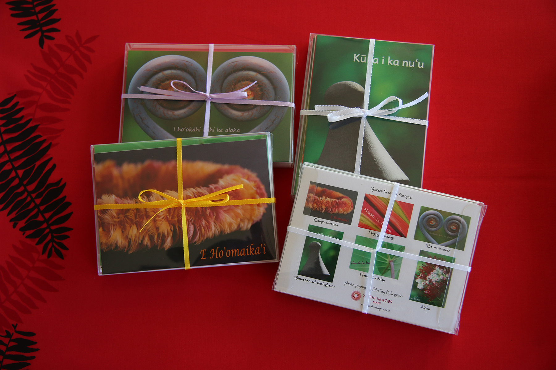 `Alohi Images’ photo cards feature translations of Hawaiian phrases on the back of each card. Pictured: A six-card Special Occasion Set by ‘Alohi Images.