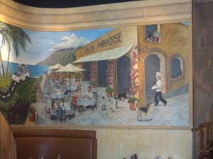 Mural on the wall at Pita Paradise. Photo by Kiaora Bohlool.