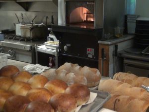 Freshly-baked bread at Matteo's. Photo by Kiaora Bohlool.
