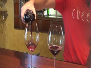 Pouring wine at MauiWine. Photo by Kiaora Bohlool.
