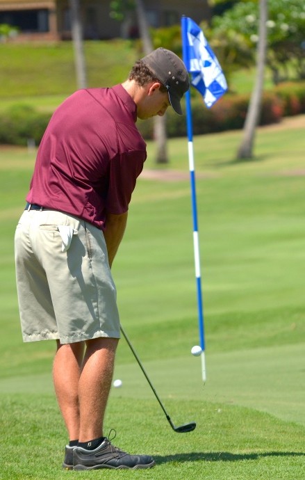 Baldwin's Ariel Elftman-Hanson played with the first-round leaders in the last group Wednesday at the Royal Kaanaplai Golf Course. Elftman-Hanson carded a 6-over-par 77 for a 151 total, which left him in 16th place. Photo by Rodney S. Yap.