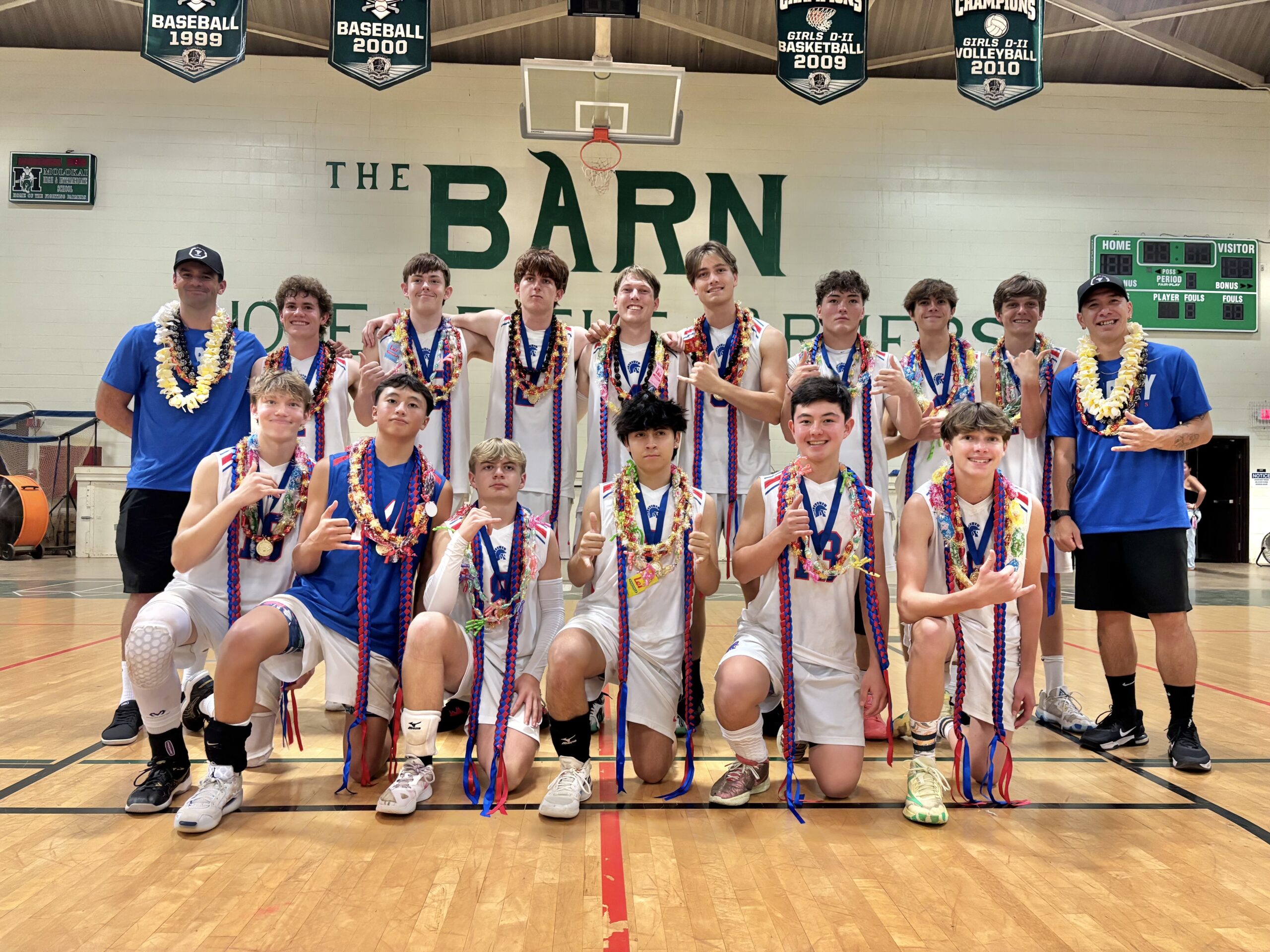 The Seabury Hall boys volleyball team poses with their MIL gold medals after claiming the league's Division II title Friday 25-27, 25-13, 25-18, 17-25, 15-7 win over Molokai in the league tournament final on Molokai. Courtesy photo