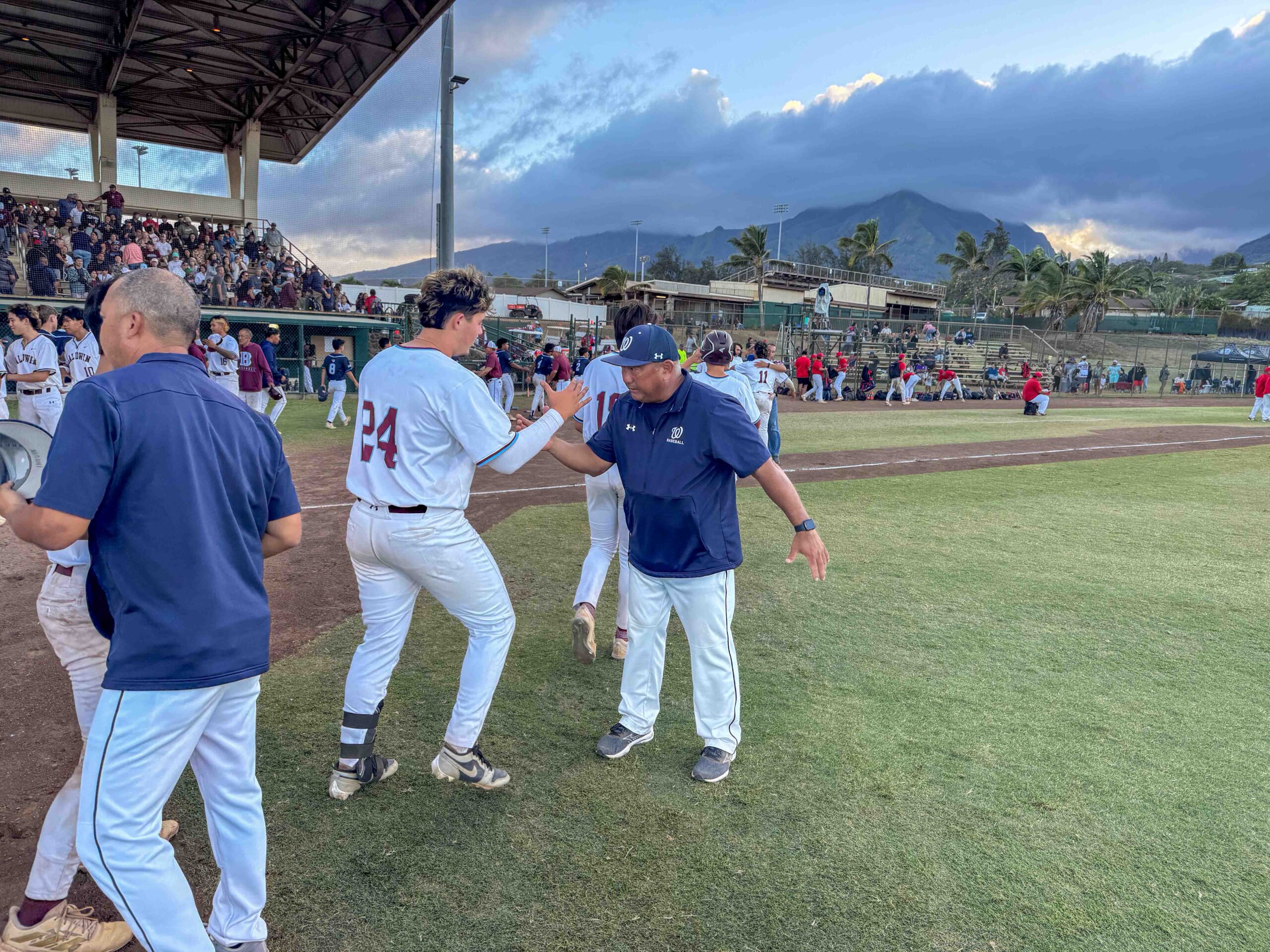Waiākea Coach Chris Honda greets Baldwin player Dylan Wellerstein after the Bears lost 1-0 in the Division 1 semifinals on May 9, 2025, at Maehara Stadium in Wailuku. HJI / ROB COLLIAS photo
