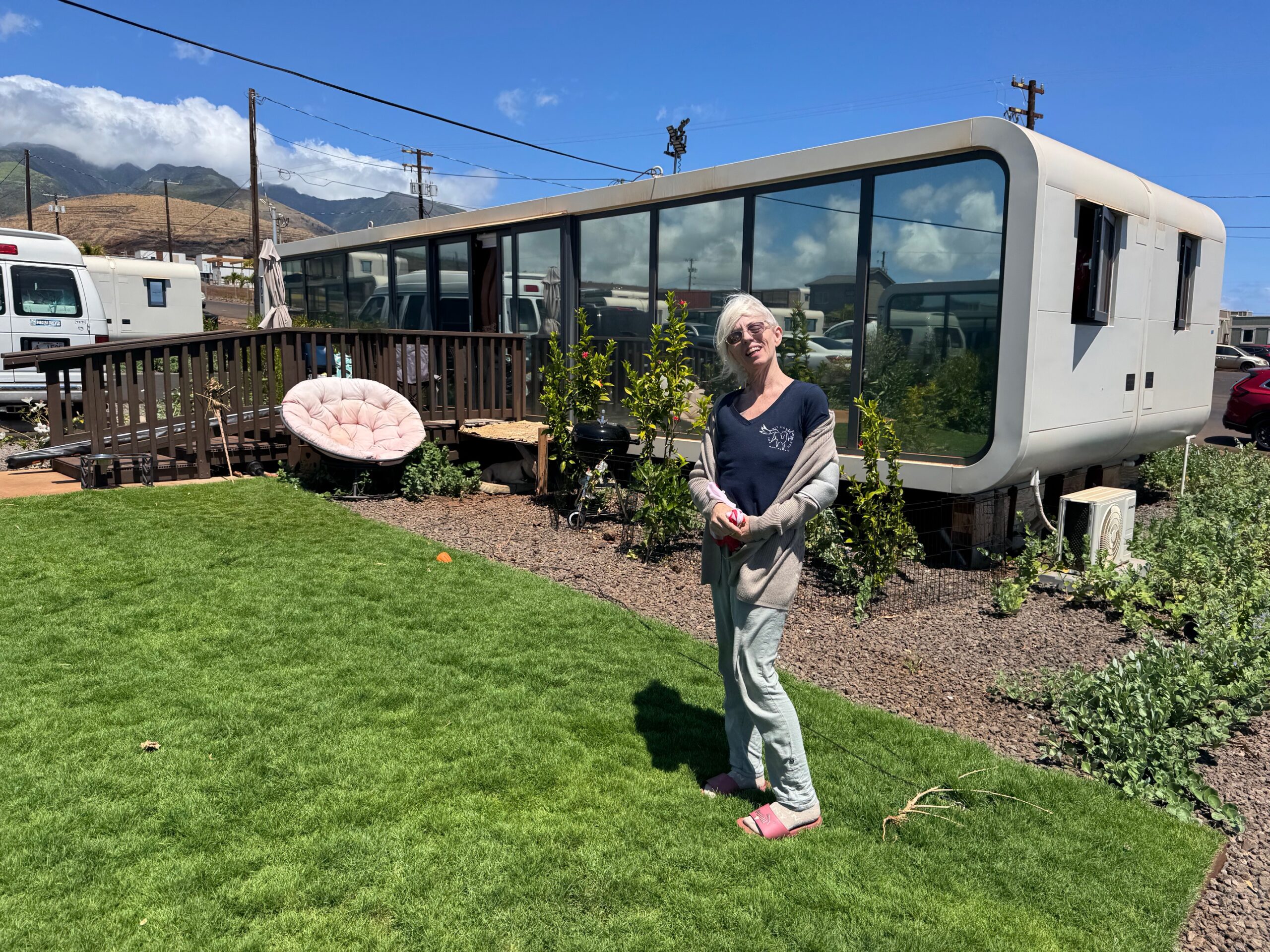 Ronda Colleen Pali stands in front of her unit in Ka La'i Ola, a 450-unit state-funded temporary housing complex in Lahaina, on Monday, June 23. HJI / ROB COLLIAS photo