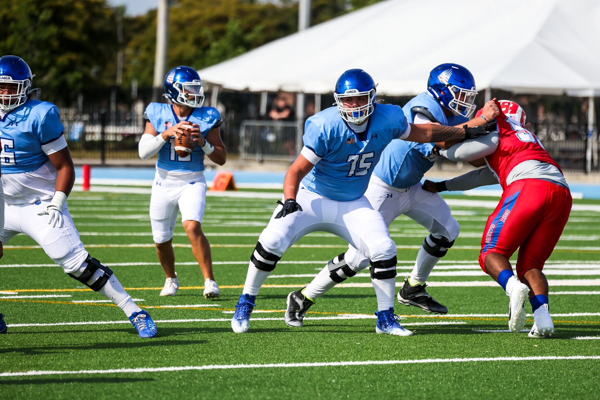 Kaholi Krau (75) blocks for IMG Academy in a game last spring against a team from Puerto Rico. Krau has returned to Maui to play for Baldwin High School for his senior season. Courtesy photo
