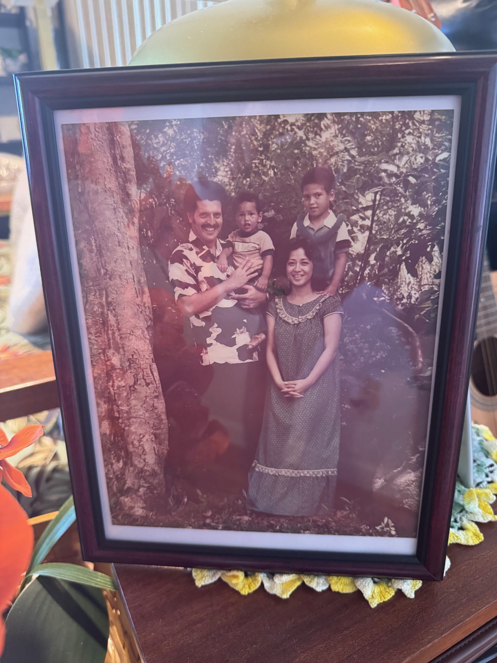 An old family photo shows the Victorino ohana in the late 1970s — from left, Mike, Shane, Joycelyn and Mike Jr. — from the Victorino home on Thursday. HJI / ROB COLLIAS photo