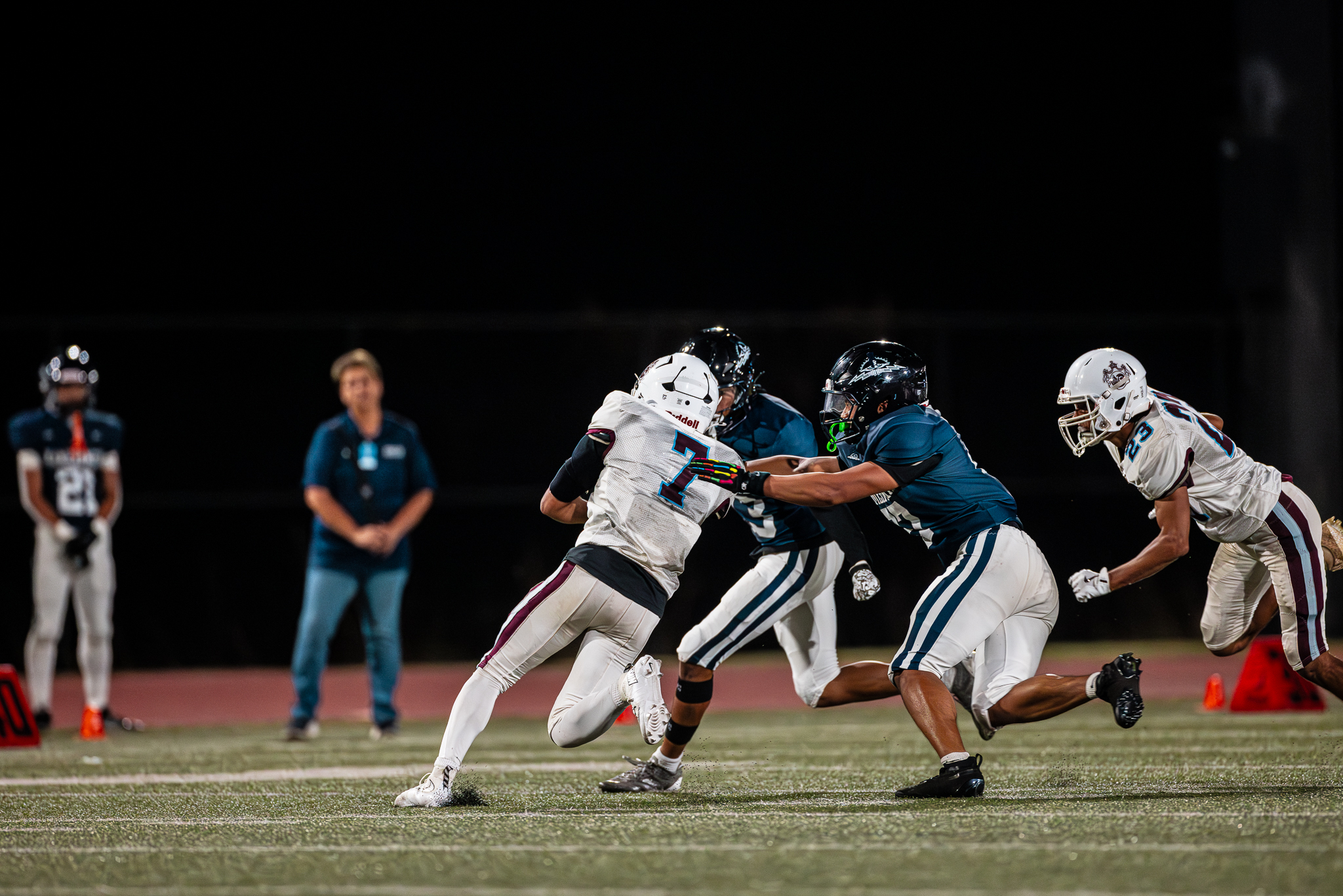 Baldwin High School running back Max Kushi (7) carries the ball in the Bears' 28-21 loss to Kamehameha Maui on Saturday night at Kanaiaupuni Stadium. Kushi finished with 183 yards on 21 carries. XYLER NAKAMURA photo