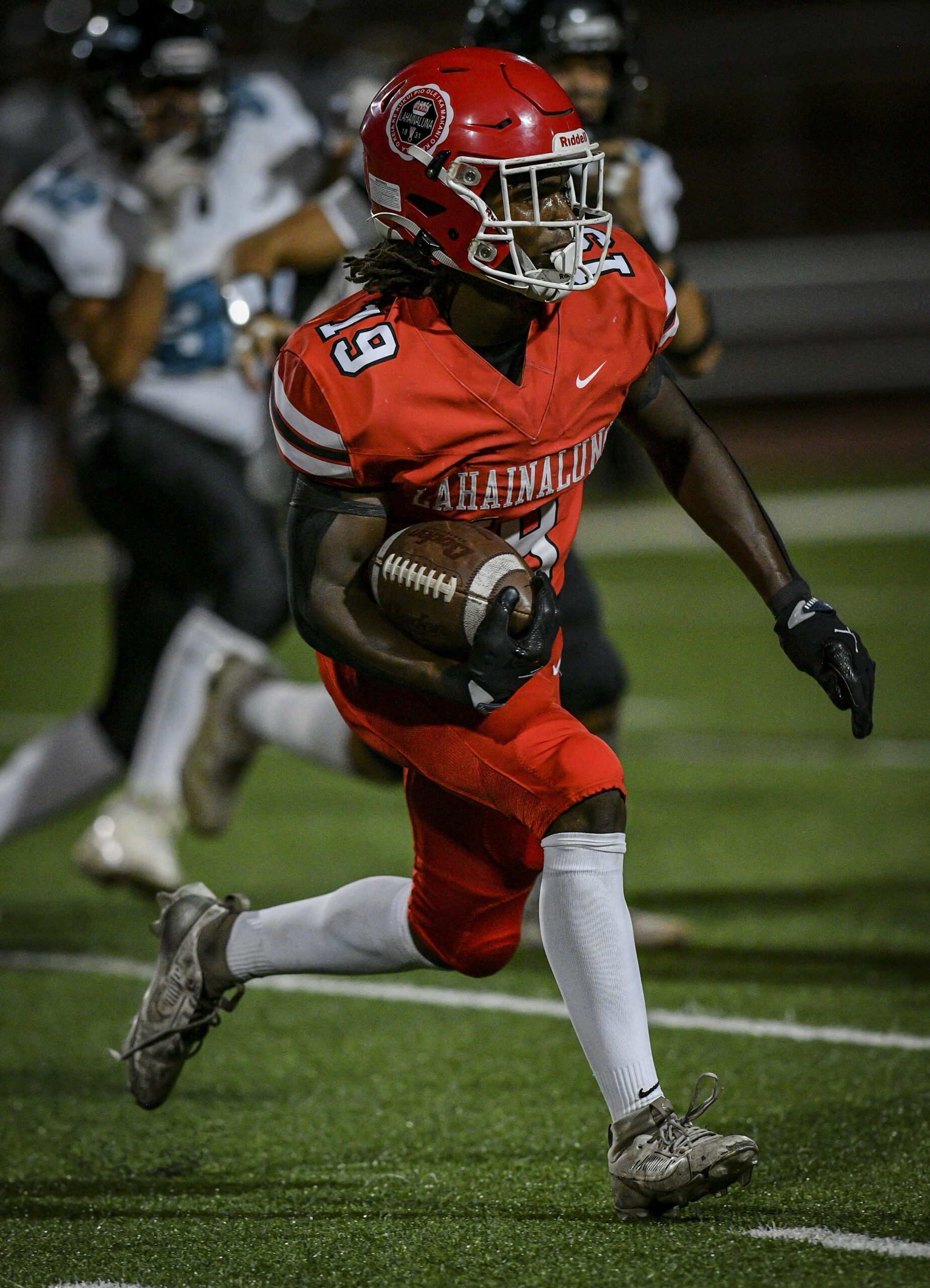 Lahainaluna Hiugh School running back Kyle Thomas ran 20 times for 227 yards and four touchdowns in the Lunas' 48-21 win over King Kekaulike on Friday in Lahaina. GLEN PASCUAL photo