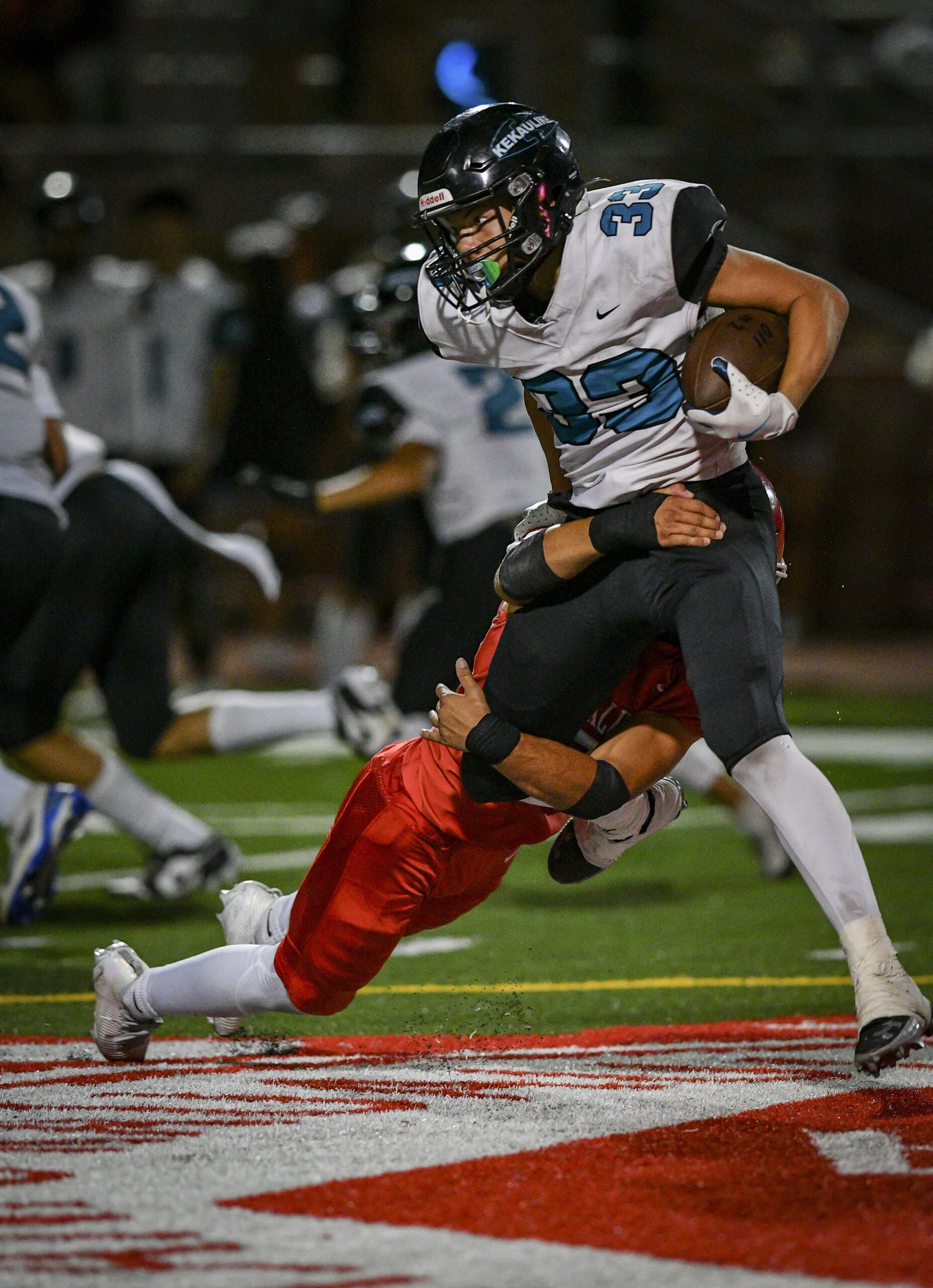 King Kekaulike High School running back Wayne Kahula was held to 27 yards on 14 carries on Friday night in Na Ali'i's 48-21 loss to Lahainaluna. GLEN PASCUAL photo