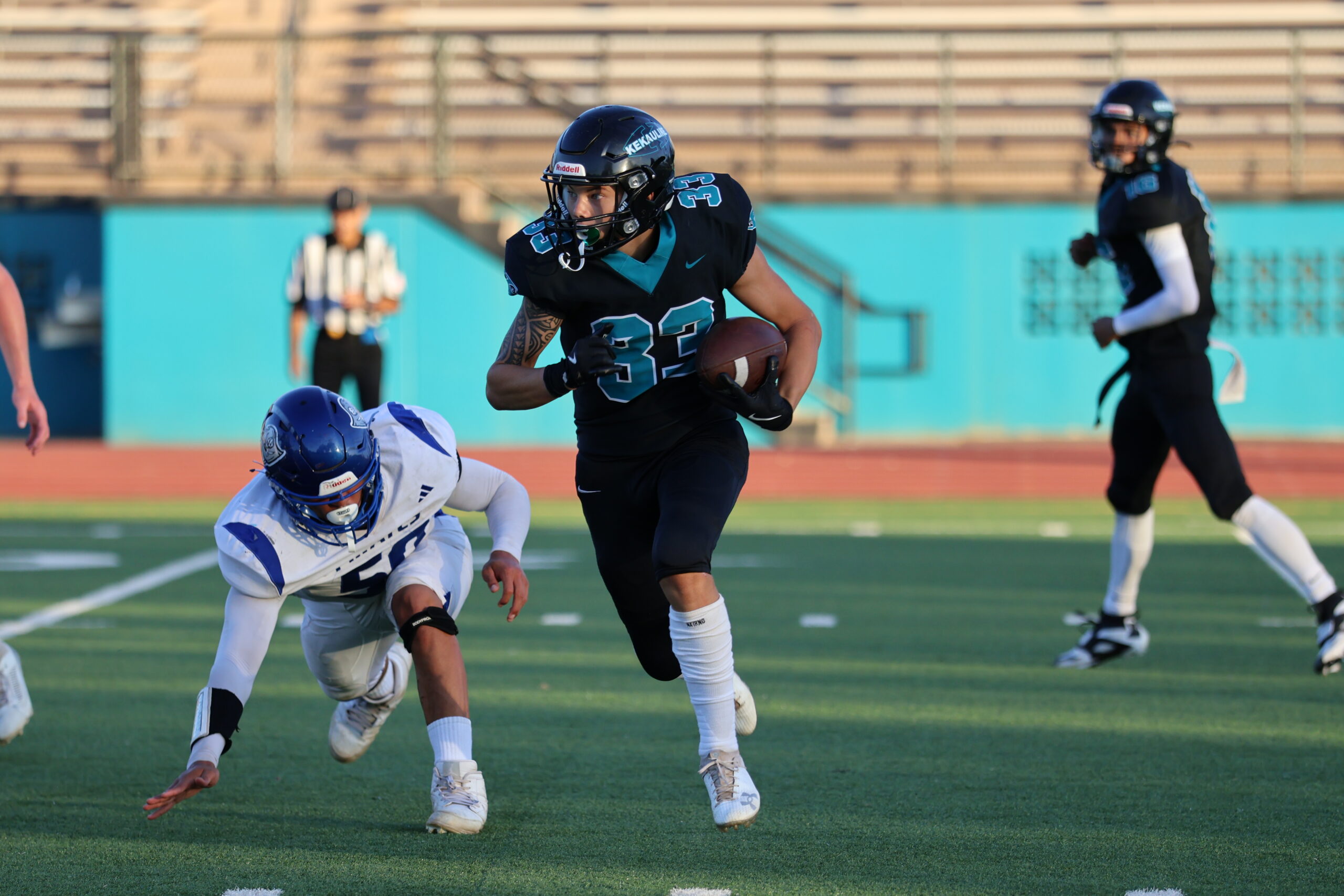 King Kekaulikle High School running back Wayne Kahula rushed for 268 yards and five touchdowns on 18 carries in Na Ali'i's 68-41 win over Morro Bay, Calif., on Saturday at King Kekaulike Stadium. REID YAMAMOTO photo
