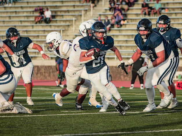 Kamehameha Schools Maui running back Xander Pagan runs to daylight in a 33-17 loss to Damien on Aug. 8 while Pa'u Spencer (77) blocks. HEZEKIAH KAPUA'ALA photo