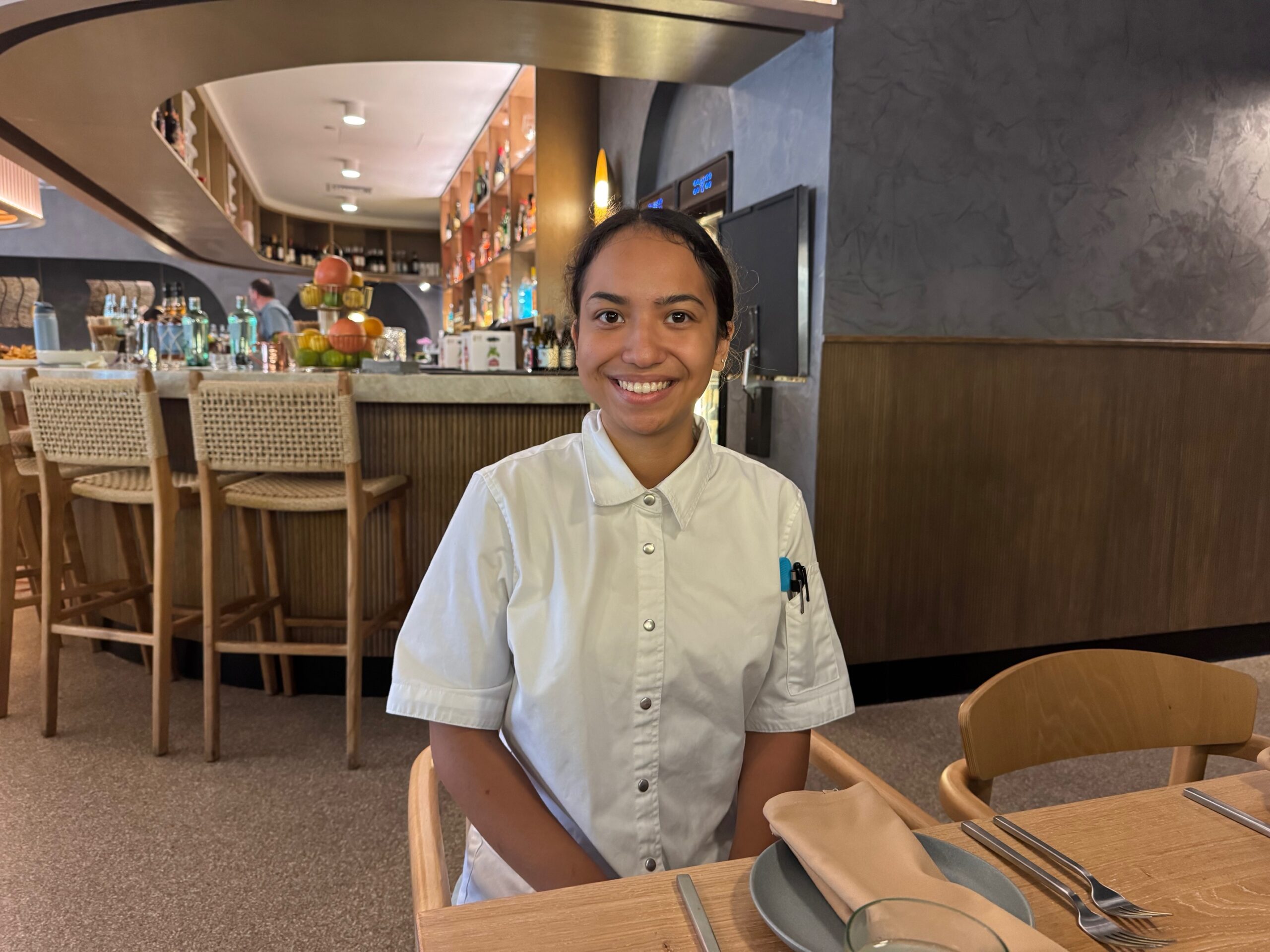 Rai Kaona, a 2023 Baldwin High School graduate, is one of 10 kitchen empoloyees at Aurum restaurant who graduated from the University of Hawai'i Maui College culinary program. HJI / ROB COLLIAS photo