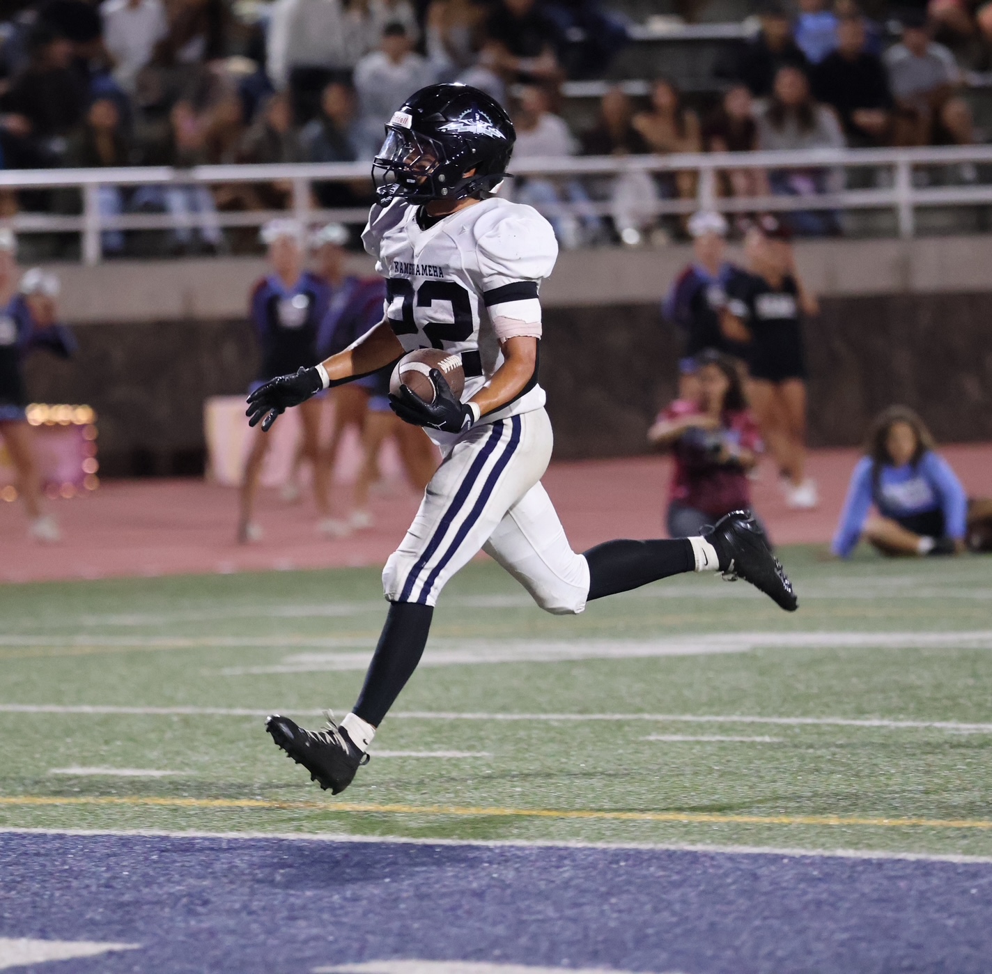 Kamehameha Schools Maui's Zedekaiah Campbell crosses the goal line at the end of a 65-yard run on Friday night in a 49-28 win over Baldwin. Campbell ran for 174 yards to go over 2,000 yards for his Kamehameha Maui career. REID YAMAMOTO photo