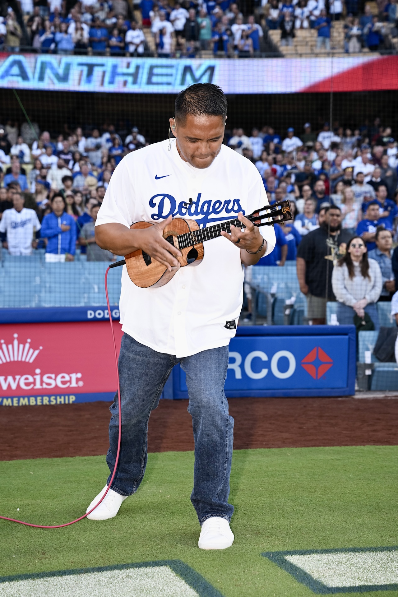 Derick Sebastian, an 'ukulele virtuoso from Maui, is shown here playing the national anthem at Dodger Stadium on July 5, 2023. Sebastian is set to play The Star-Spangled Banner at Dodger Stadium again today. Carrie Giordano/Los Angeles Dodgers photo