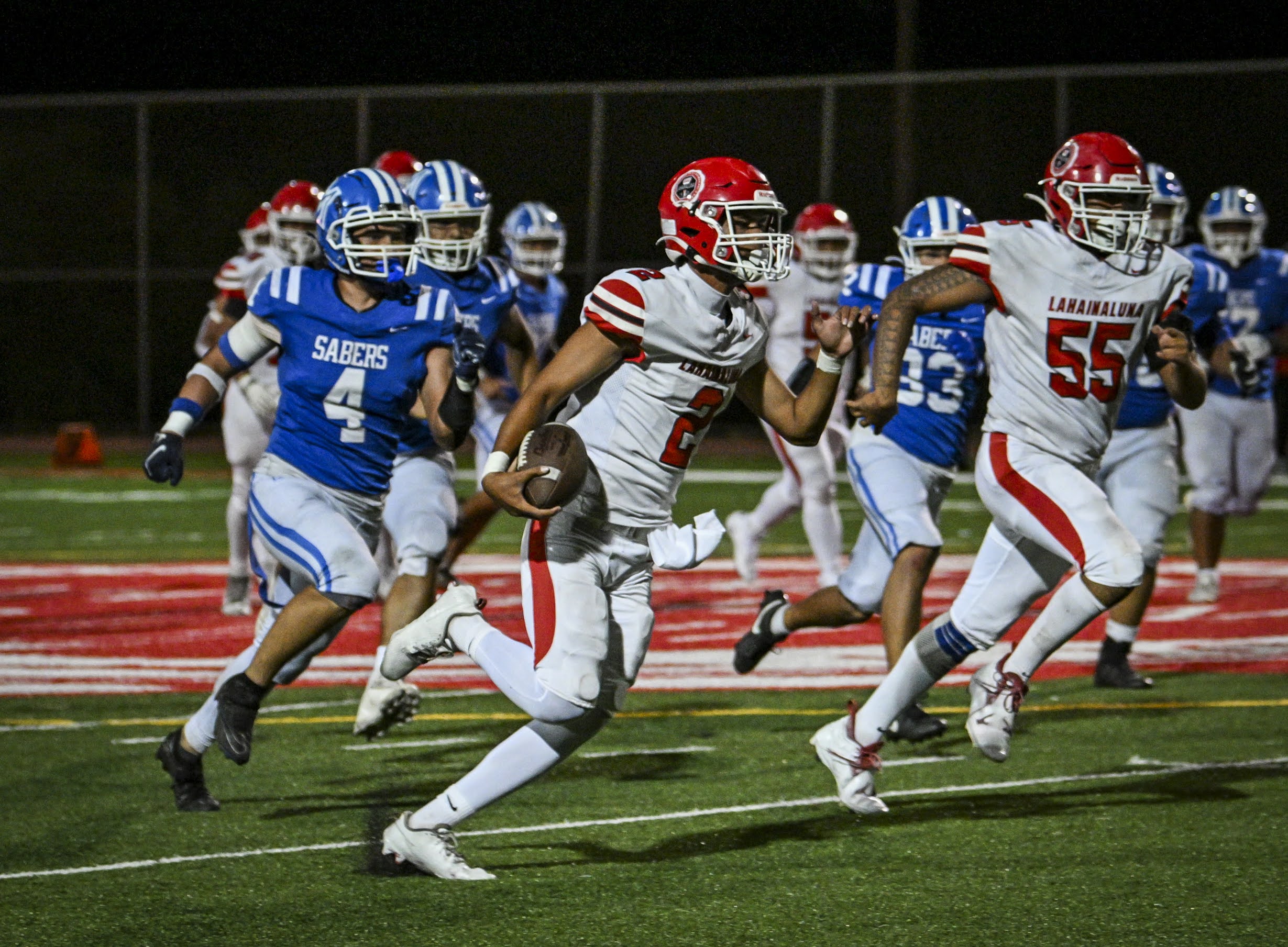 Lahainaluna High School quarterback Leka Rosenthal ran for 38 yards and passed for 117 in the Lunas' 49-14 win over Maui High on Saturday. GLEN PASCUAL photo