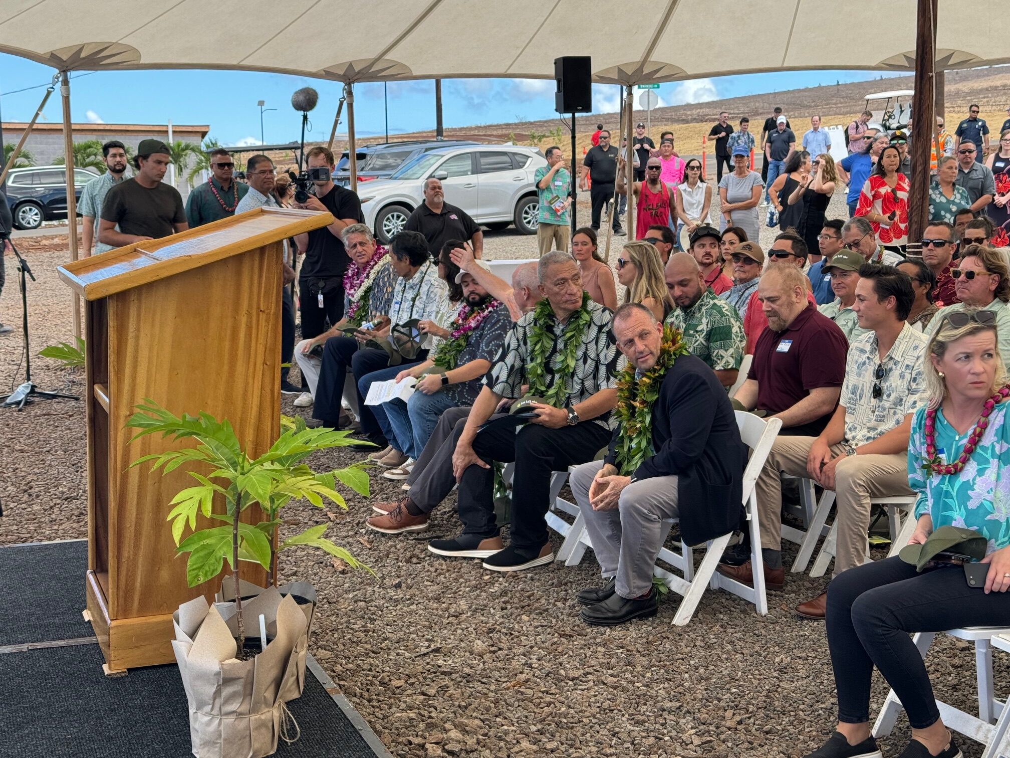 Hawai'i Gov. Josh Green and Maui Mayor Richard Bissen look to their left during the presentation portion of the Ka La'i Ola "completion celebration" on Wednesday in Lahaina. HJI / ROB COLLIAS photo