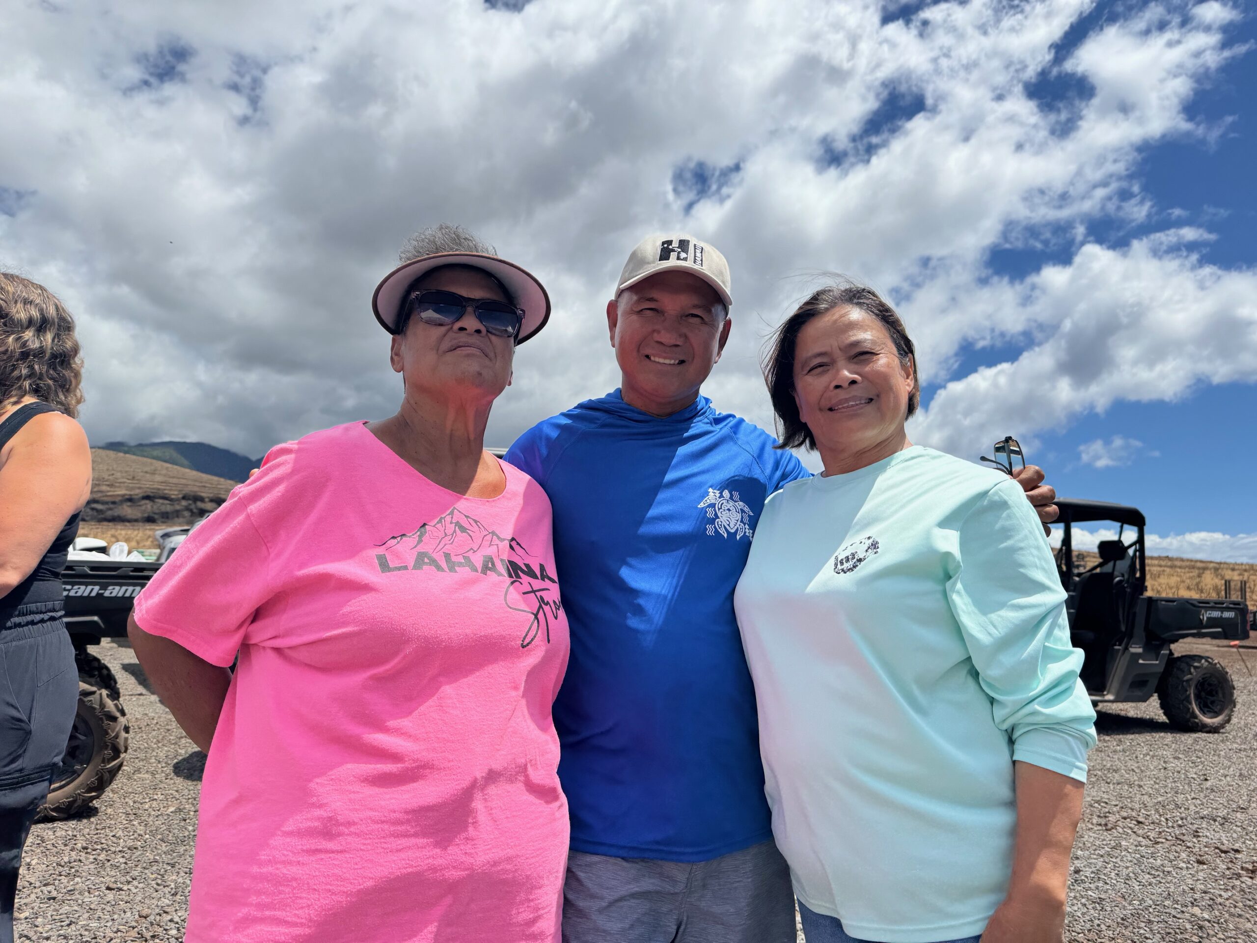 Ka La'i Ola residents (from left) Louella Haia, Jerry Santos and Juliet Mosqueda-Santos attended the "completion celebration" for the 450-unit temporary housing complex on Wednesday. HJI / ROB COLLIAS photo