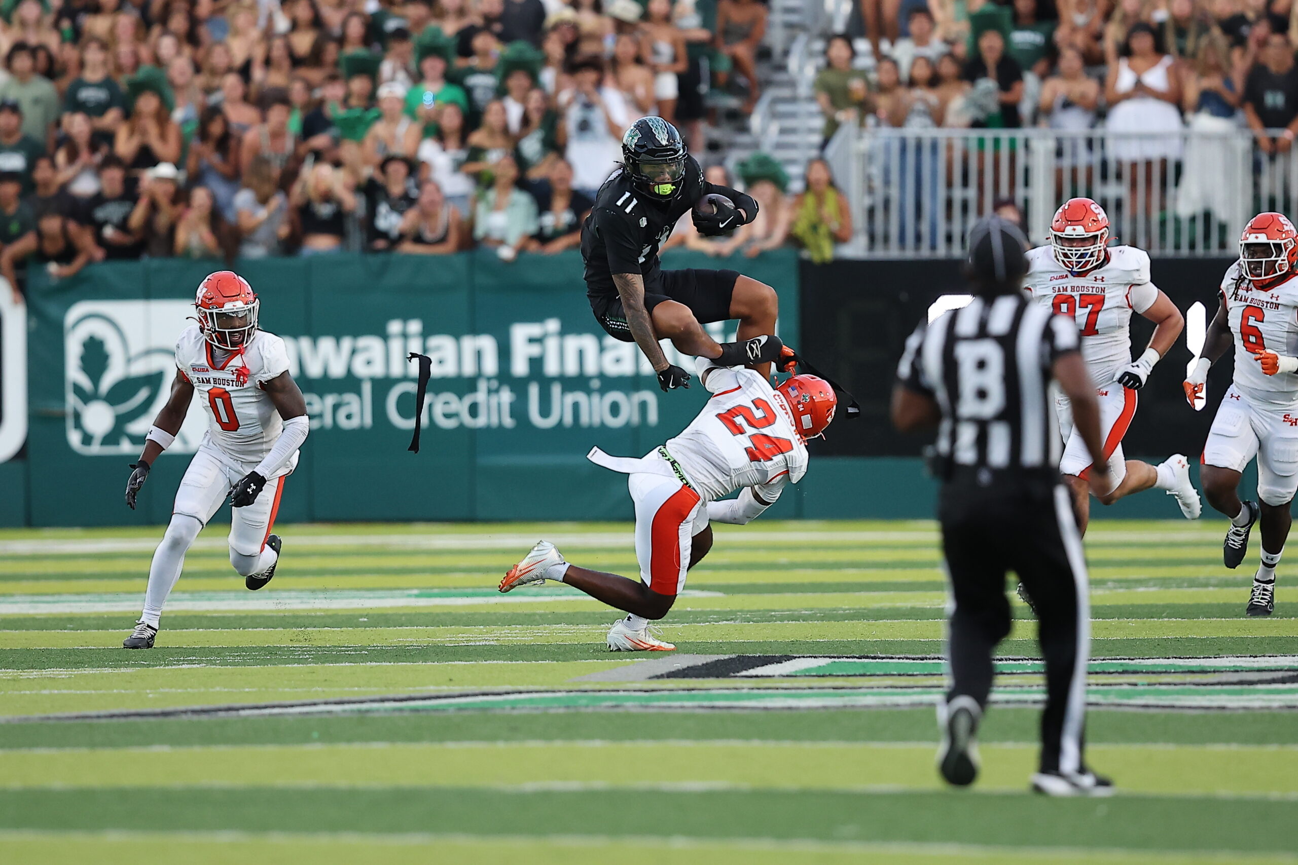 University of Hawai'i senior wide receiver Karsyn Pupunu goes airborne after a catch in a 37-20 win over Sam Houston on Sept. 6 at the Clarence T.C. Ching Complex. University of Hawai'i Athletic Department photo
