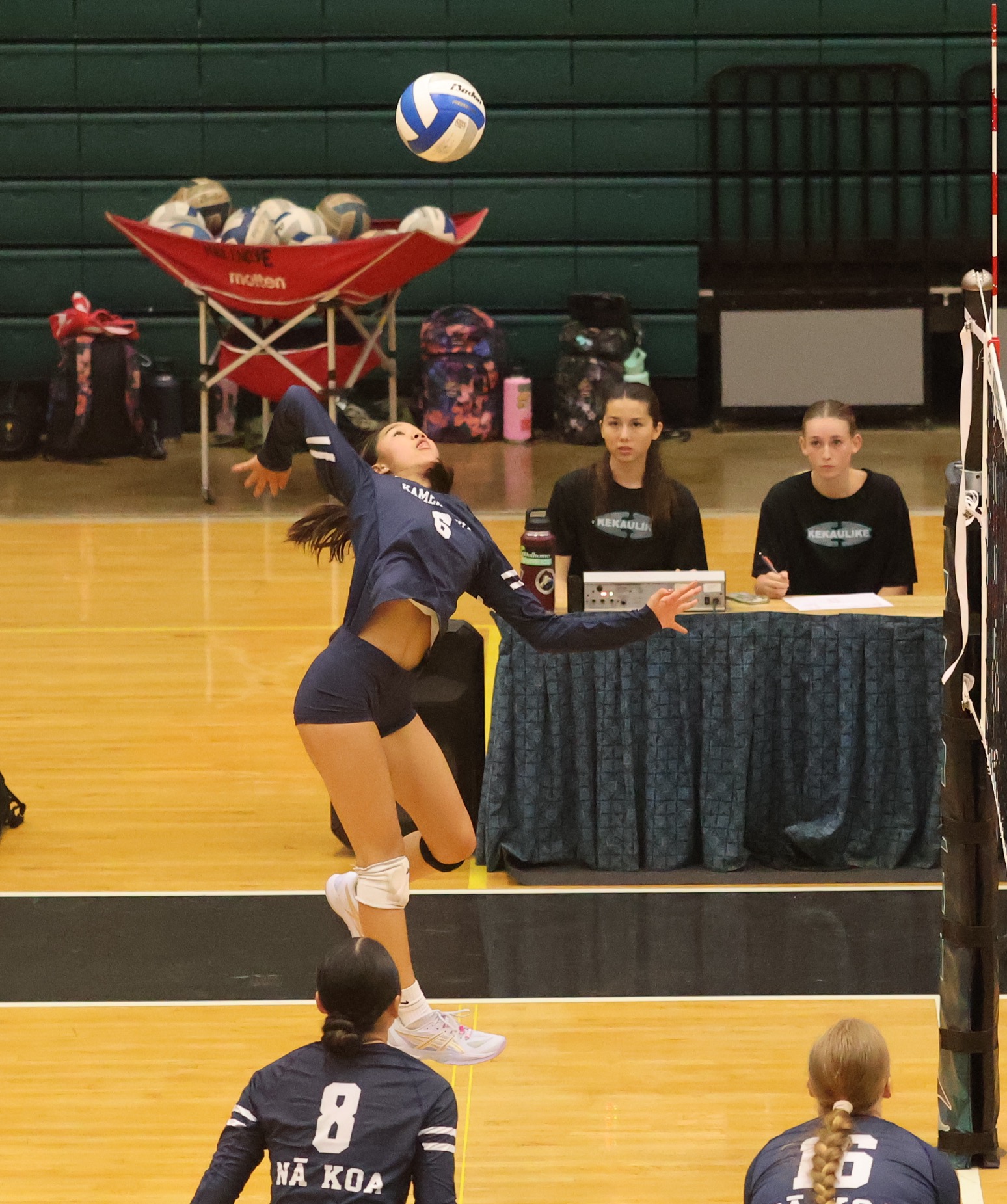 Archer Fabrao, a 5-foot-8 senior outside hitter for Kamehameha Schools Maui girls volleyball team, prepares to smack one of her eight kills during the Warriors' sweep of King Kekaulike on Tuesday. REID YAMAMOTO photo